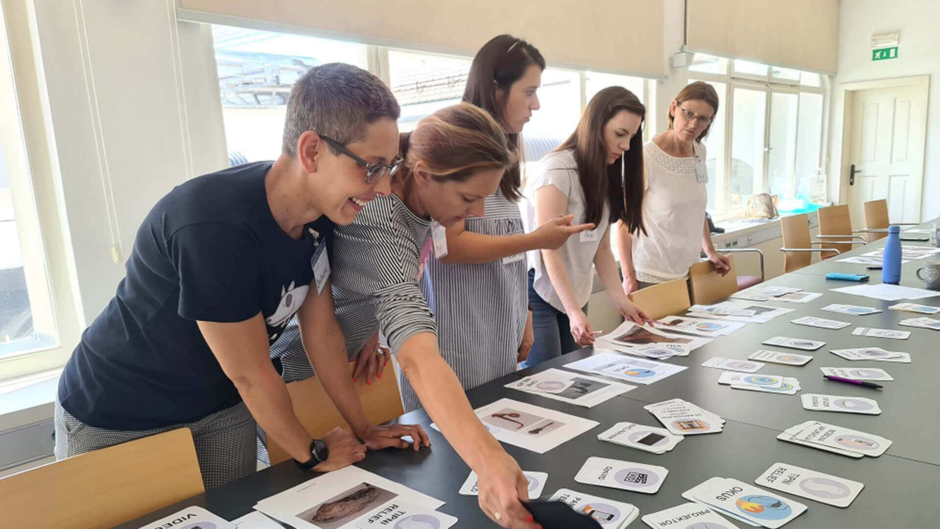 professionals conducting collage activity in Gorenjska Museum